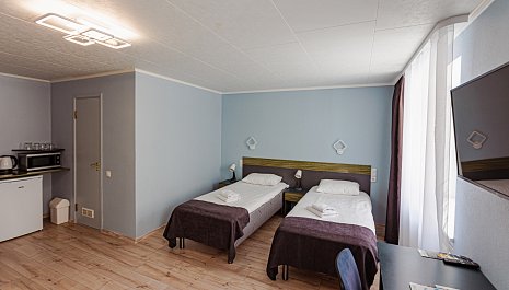 Room with three beds