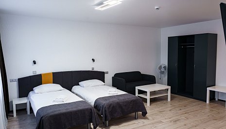 Room with sauna and two beds